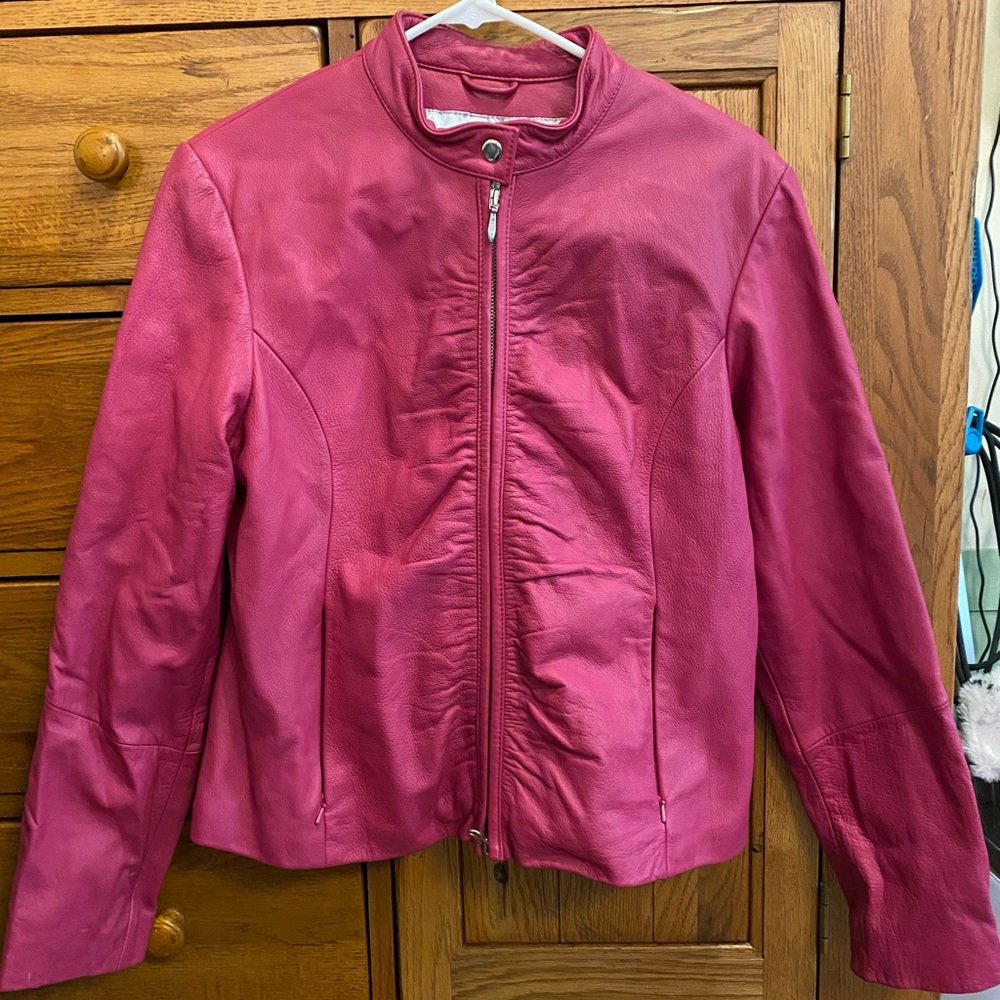 Wilson’s leather maximum jacket. Deep pink color. Size large